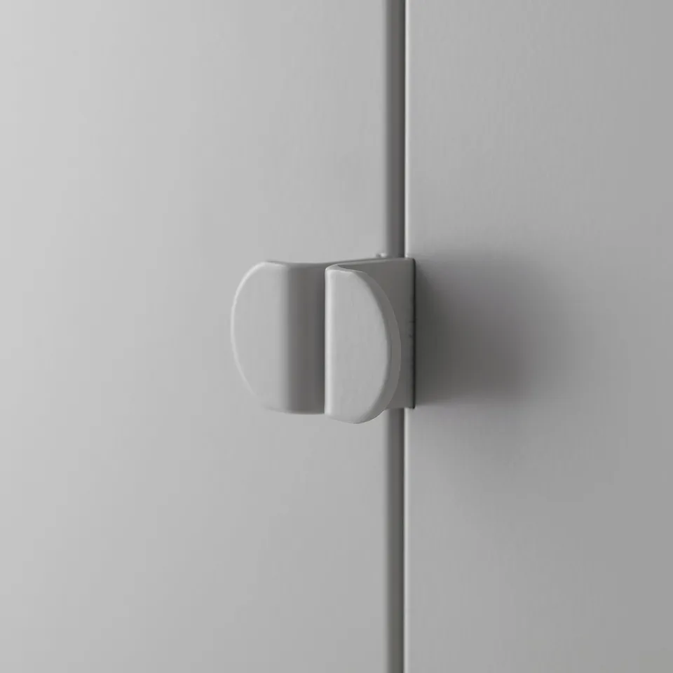 Minimalist handle on smooth cabinet door, showcasing sleek, modern design and refined finish.