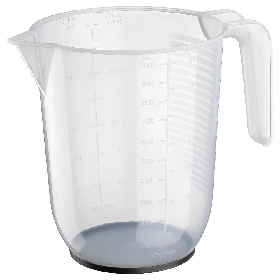 A BEHÖVA measuring jug, white, made of polypropylene and synthetic rubber, transparent, with easy-to-read markings.