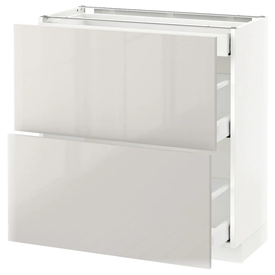 Modern white high-gloss ikea kitchen cabinet with drawers, sleek and clean design.