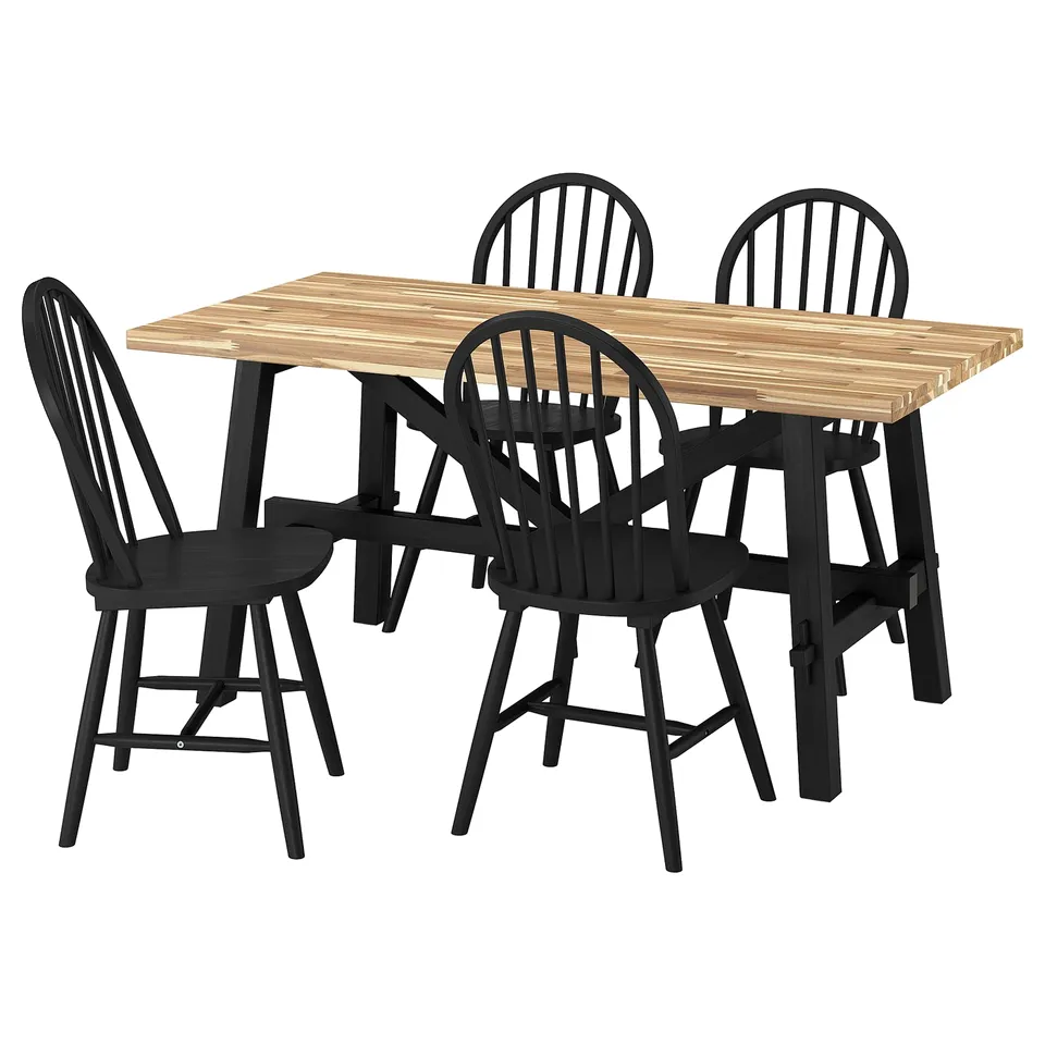 SKOGSTA dining set: black chairs, light wooden table, minimalist.