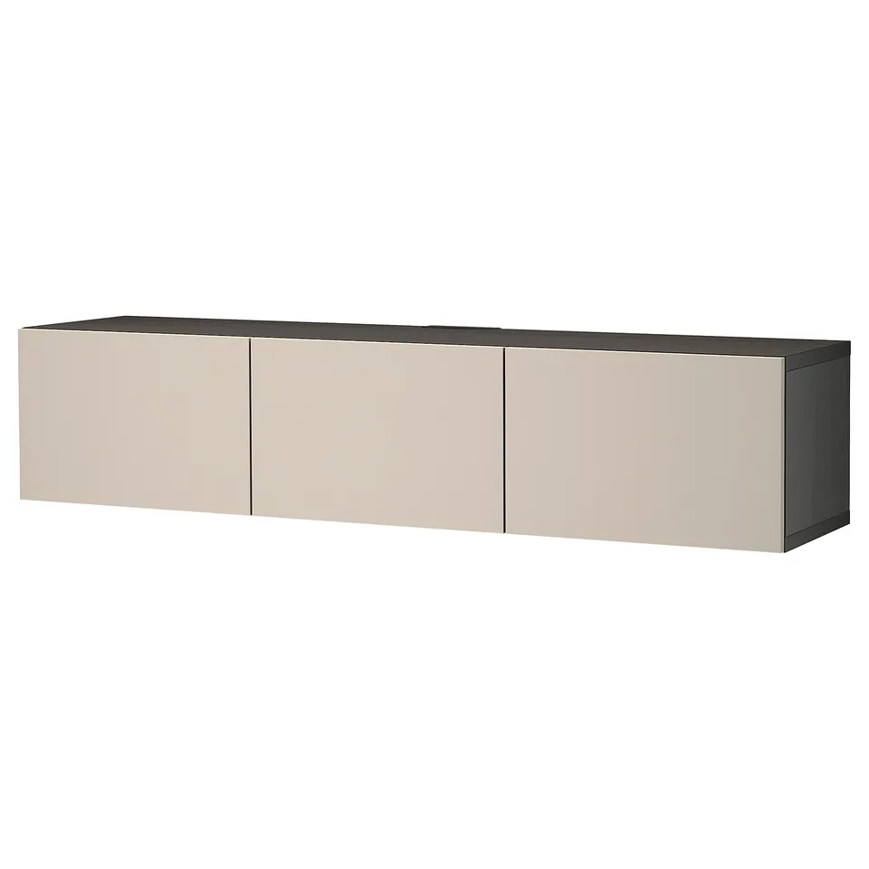 A beige BESTÅ tv bench with three doors, offering hidden storage and cable management.