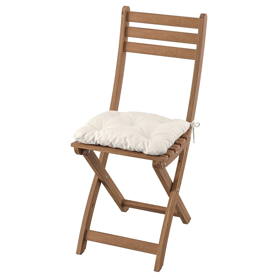 Brown wooden folding chair with white cushion.