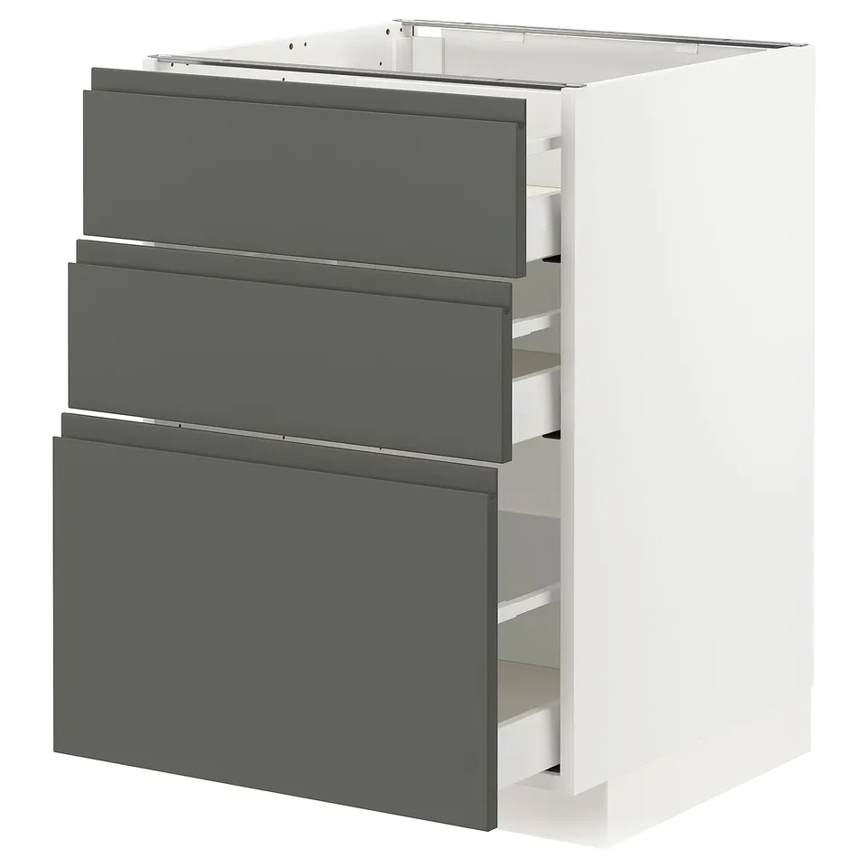 METOD kitchen cabinet with three grey drawers, partially open.