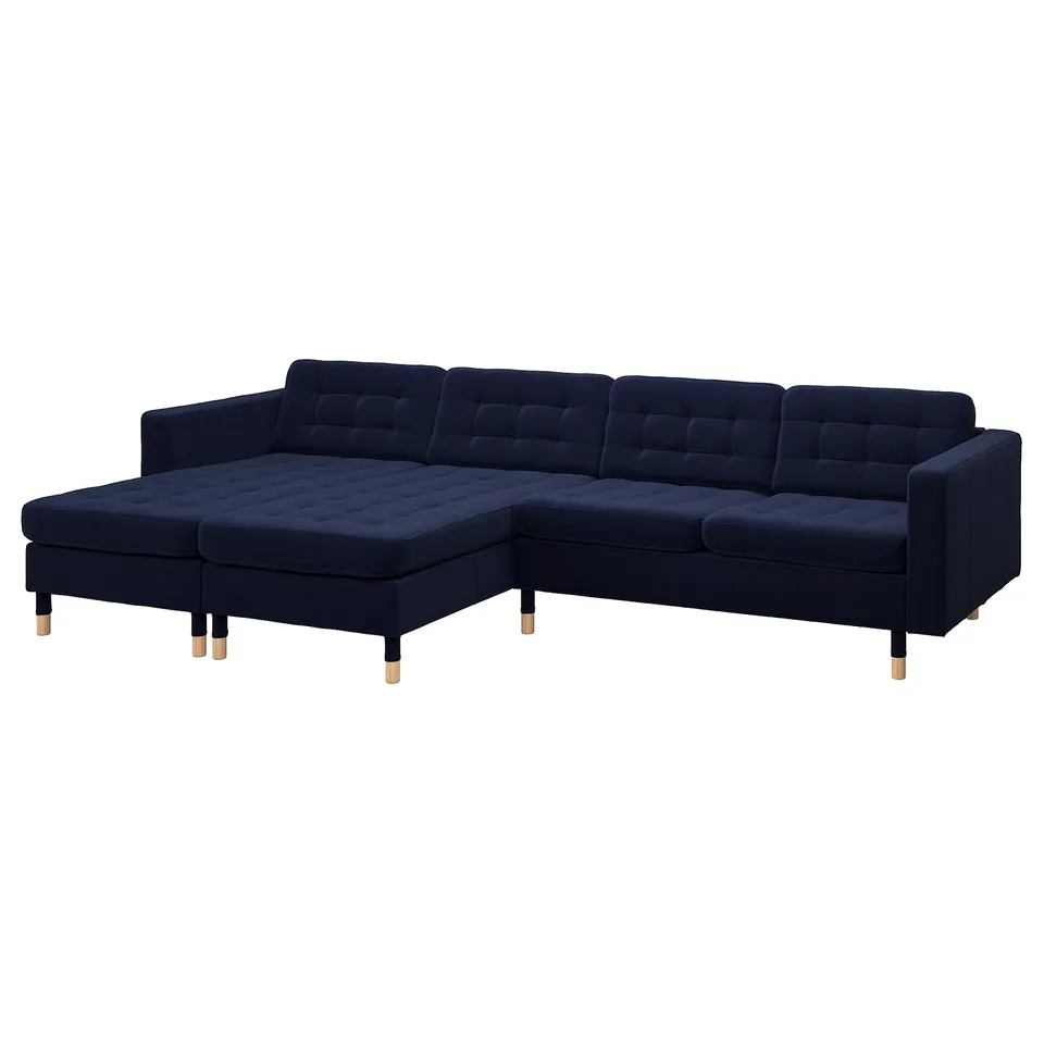 A deep blue, l-shaped loveseat sofa with a modern design and tufted backrest, supported by wooden legs.