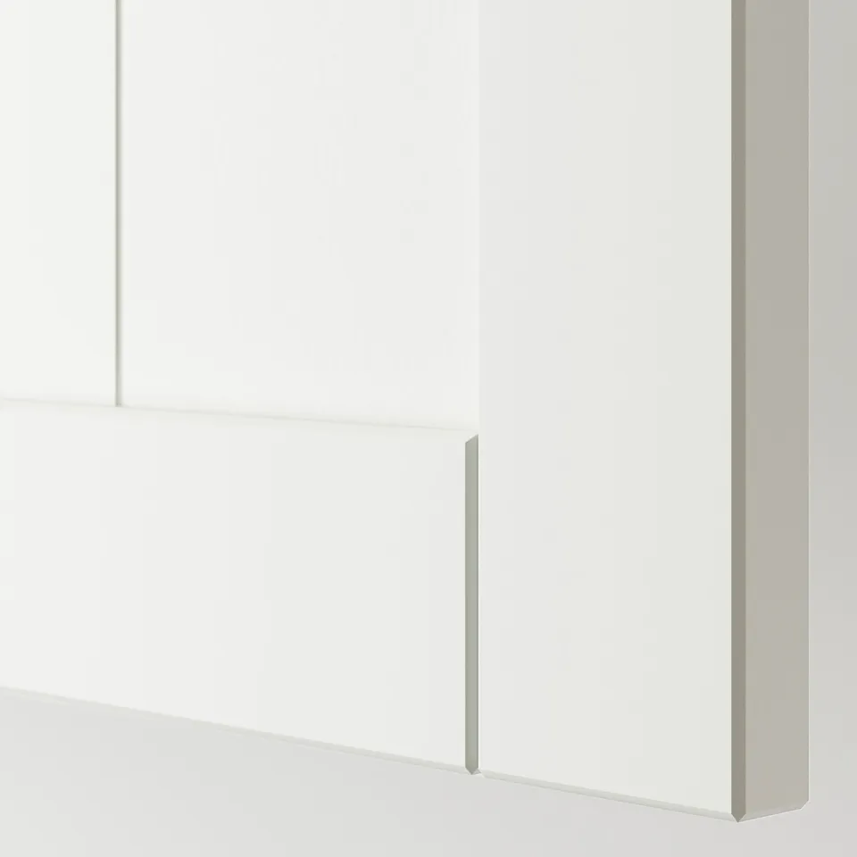 Clean, white drawer front with a bevelled edge and simple frame design, showcasing high-quality craftsmanship.