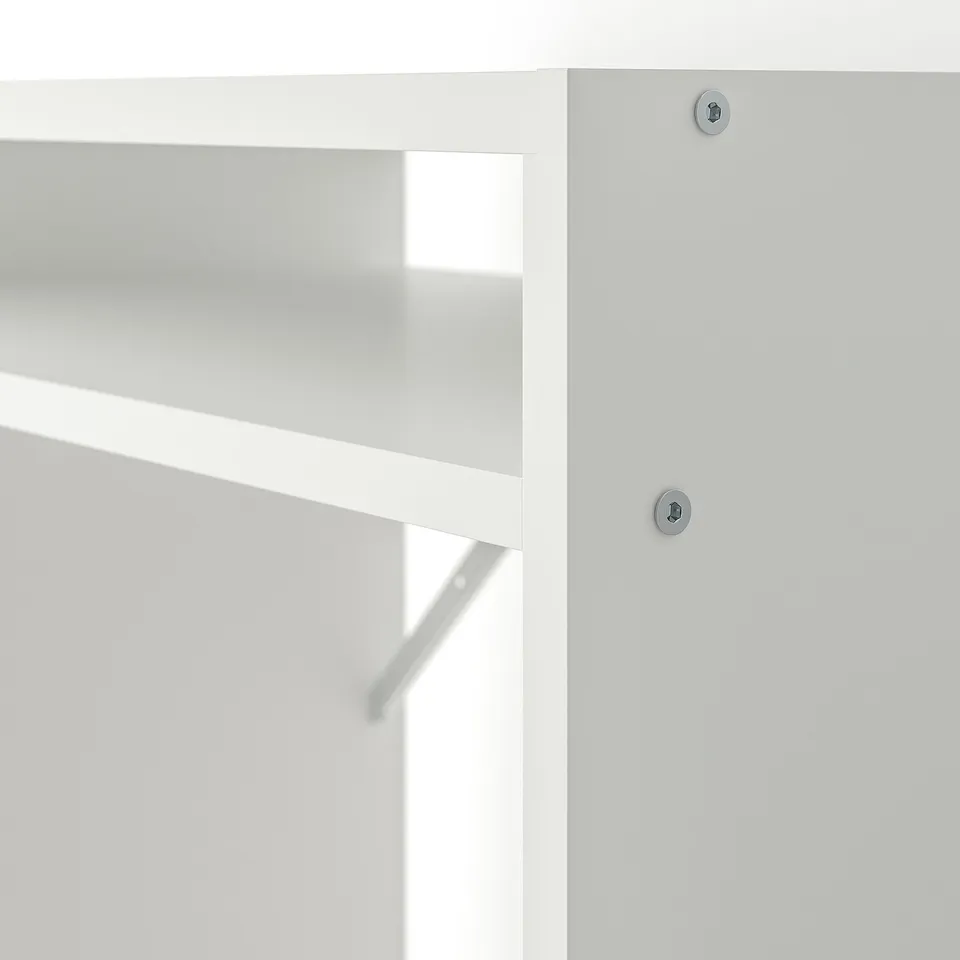 Close-up of modern white desk edge showcasing clean design and quality materials.