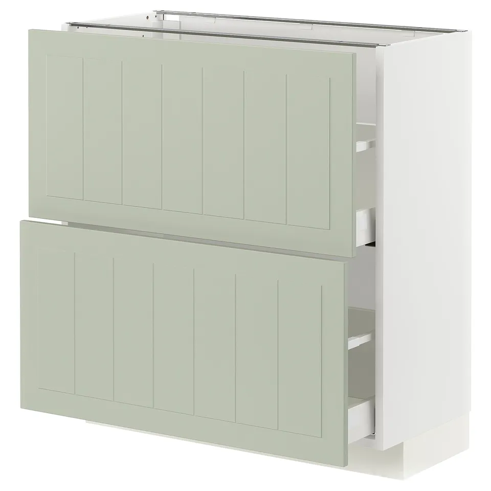 Ikea METOD kitchen unit in green with white drawer pulls, rectangular shape and vertical panel design.