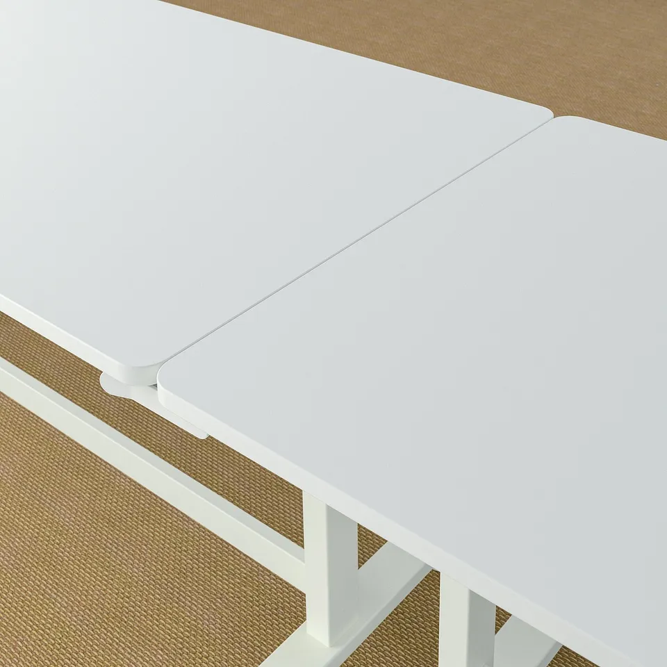 Foldable meeting table with castors, designed for easy setup and storage.