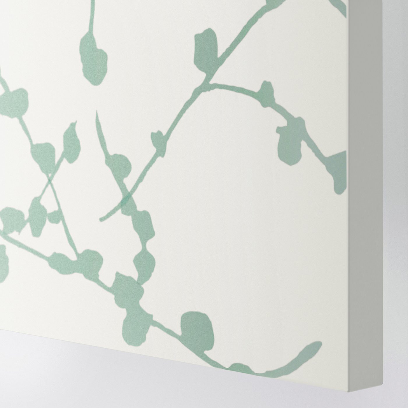 Minimalist green branch design on white door.