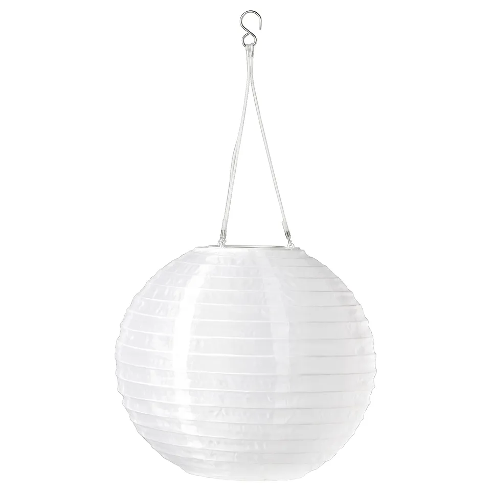 A hanging SOLVINDEN light, white, round, made from recycled materials, suspended by a cord.