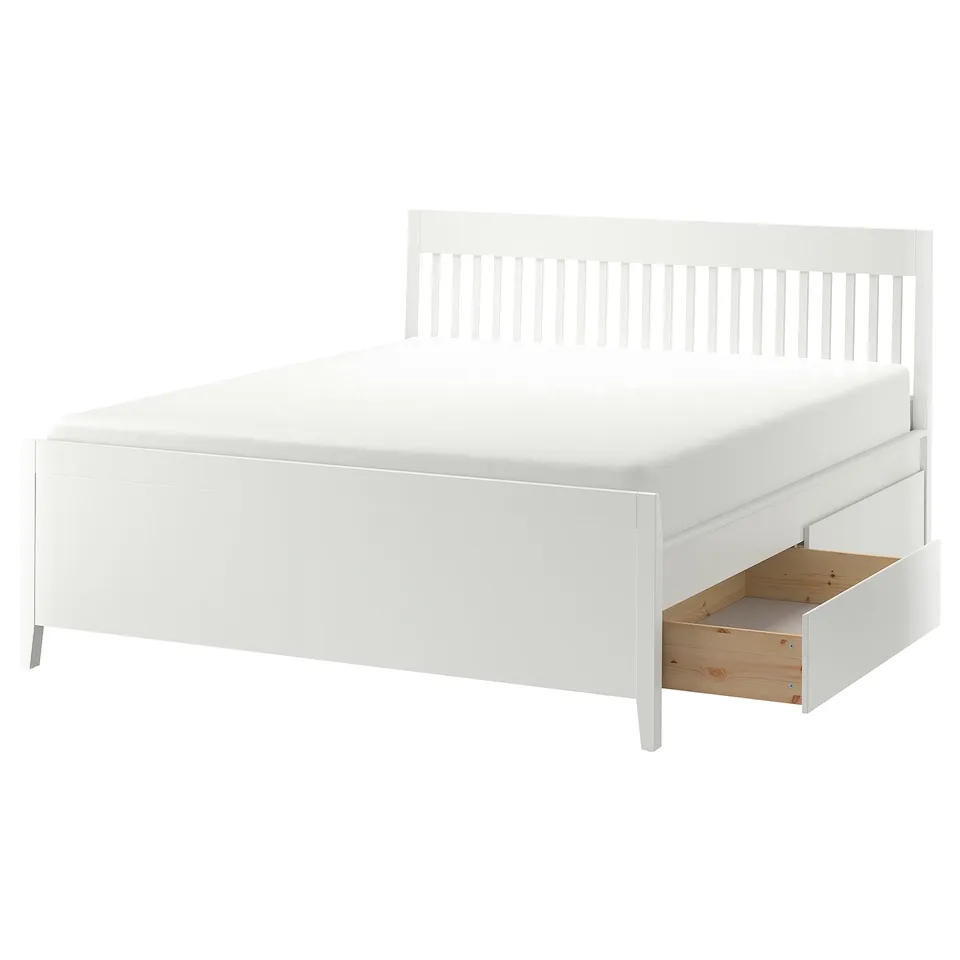 The IDANÄS bed frame is white with a slatted headboard. It four under-bed drawers for storage. Made of wood and metal, it has a clean, modern design.