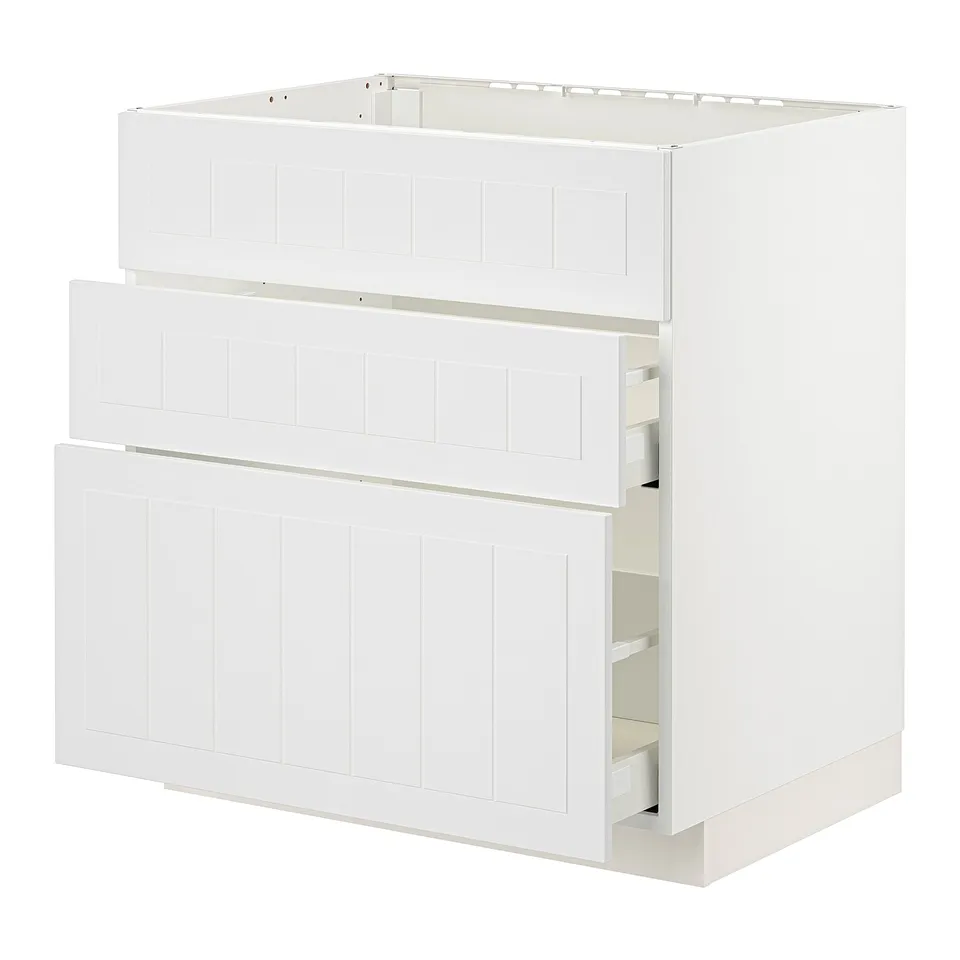 METOD kitchen unit in white with two open drawers.