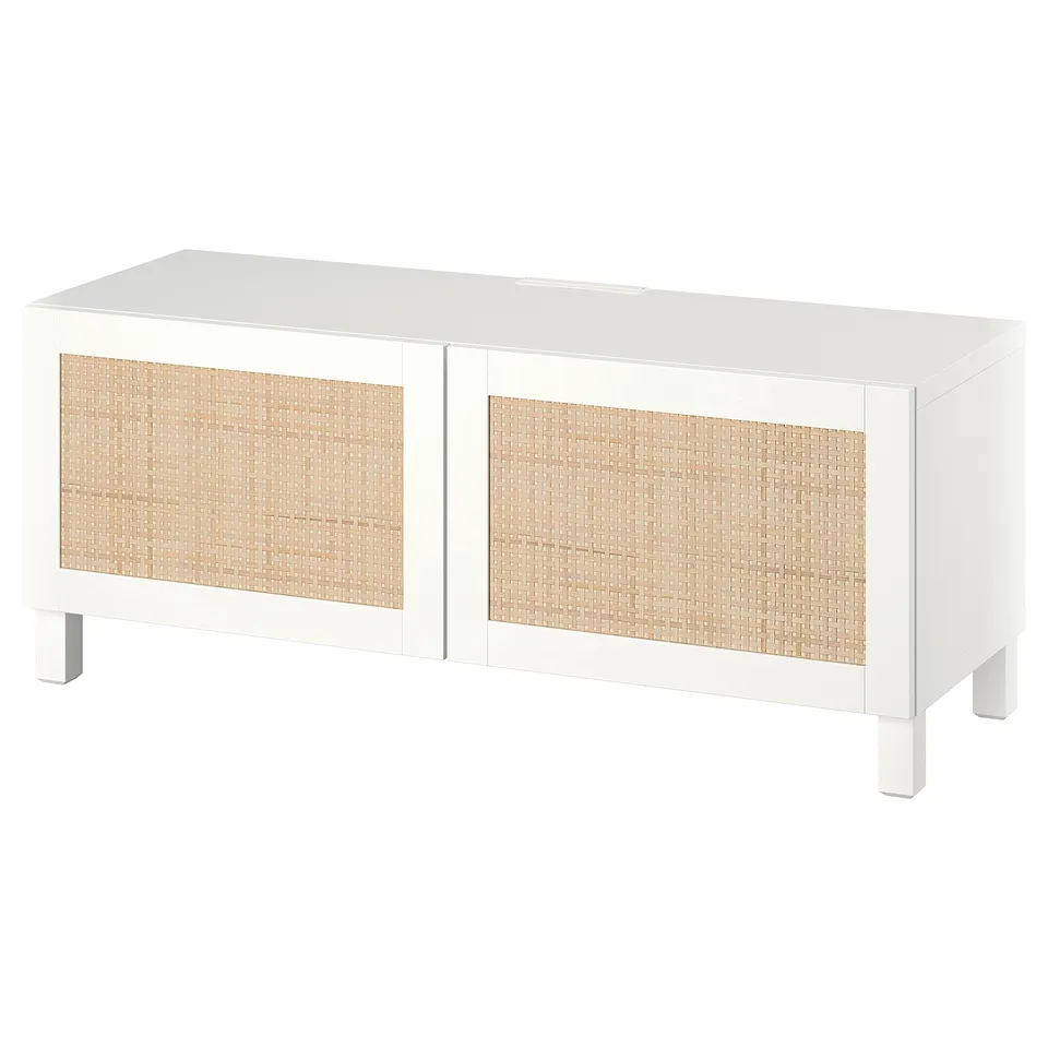 White BESTÅ tv bench, wicker doors, square legs, modern minimalist design.