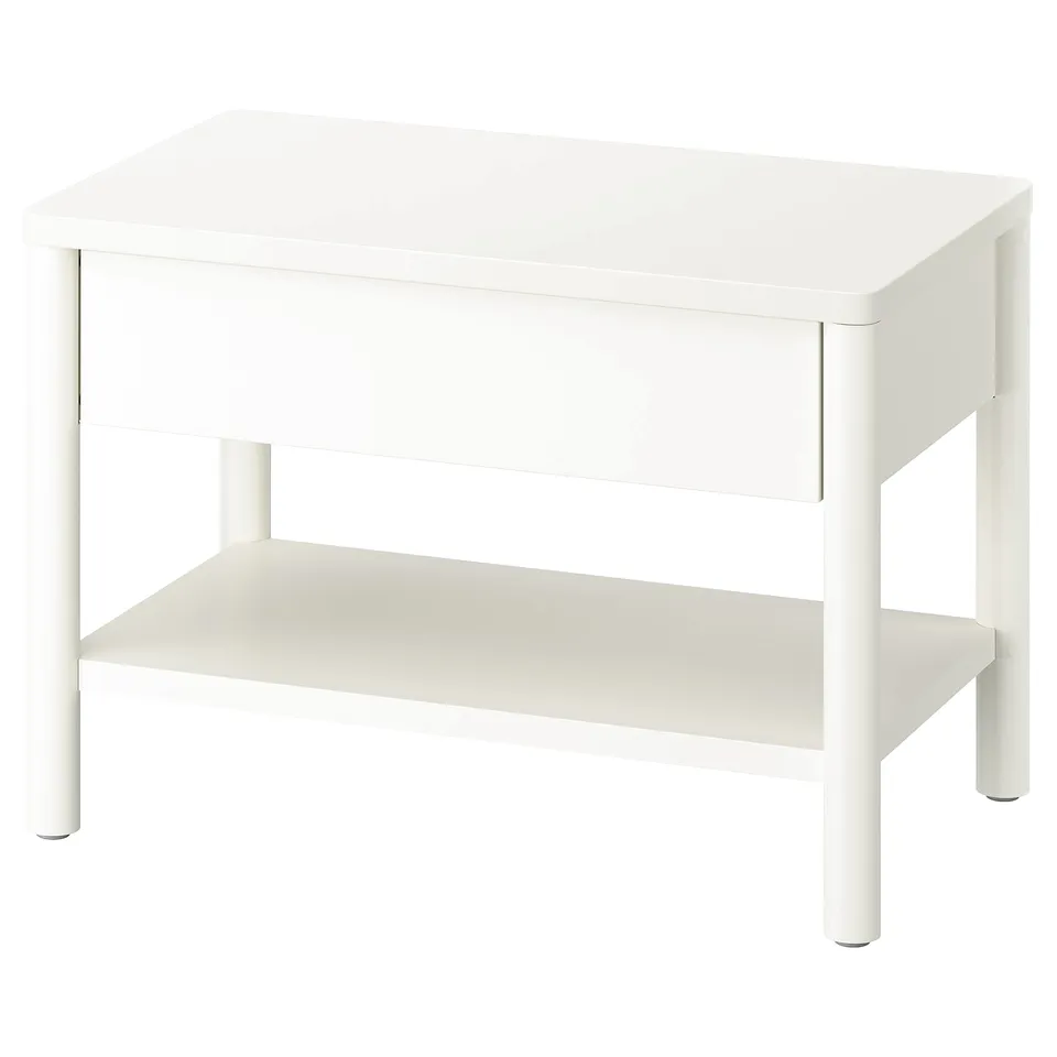 A white TONSTAD side table. It has a rectangular top with a soft-close drawer and a bottom shelf. The design is modern and functional.
