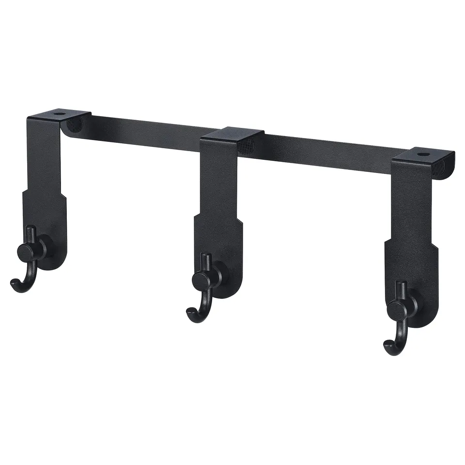 A black valasjon over-the-door hanger with three hooks, designed for storage.