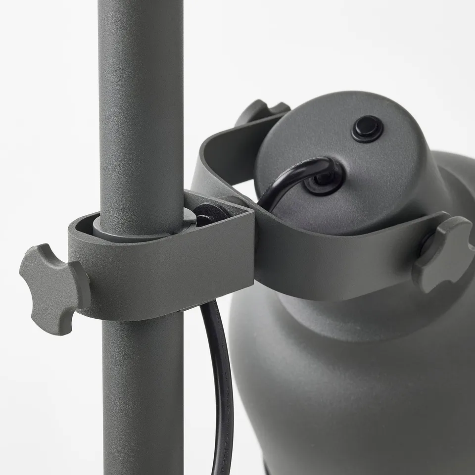 Adjustable metal lamp with sleek design, featuring a clamp and knurled knobs for secure positioning, offering versatile lighting options.