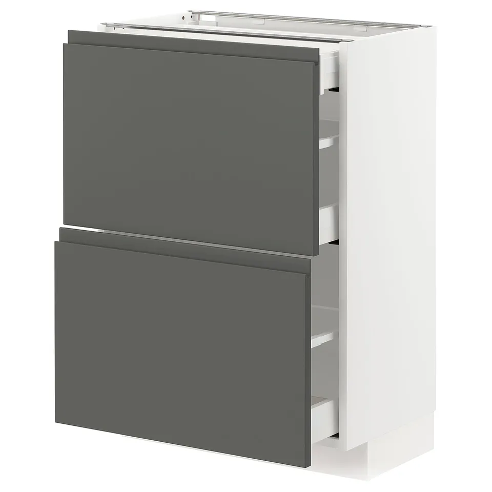 Modern kitchen cabinet in white and dark grey with integrated handles and smooth drawer runners.
