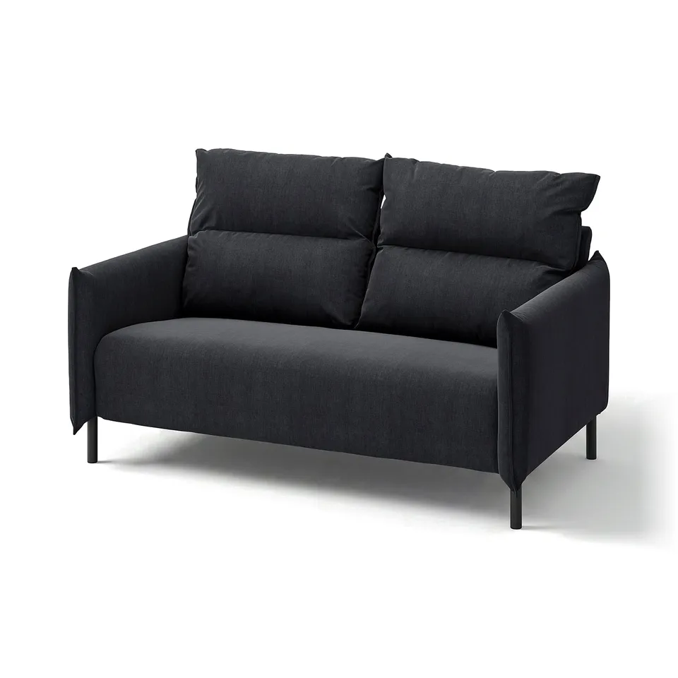 A grey MANNARP loveseat. Its modern, sleek, and upholstered in saxemara fabric.