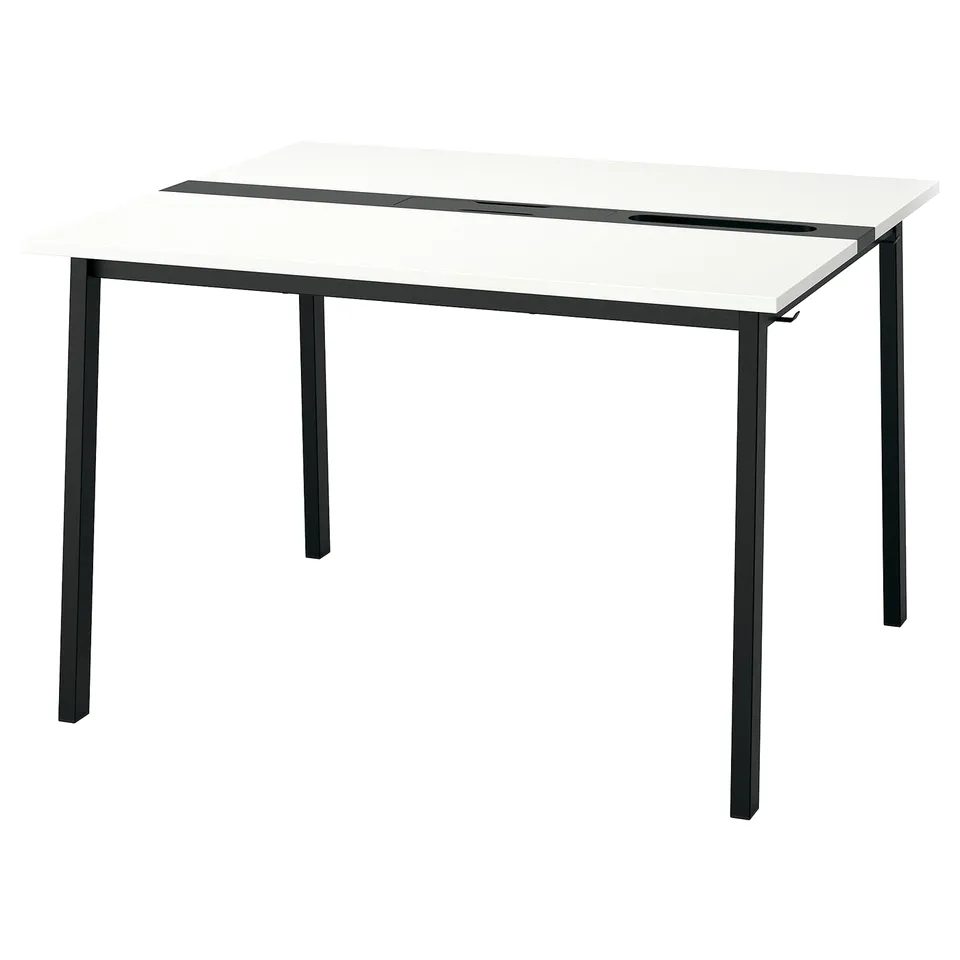 The MITTZON desk is white, rectangular, and modern with black legs. Made of fibreboard and powder coating, it stands out with its clean design.