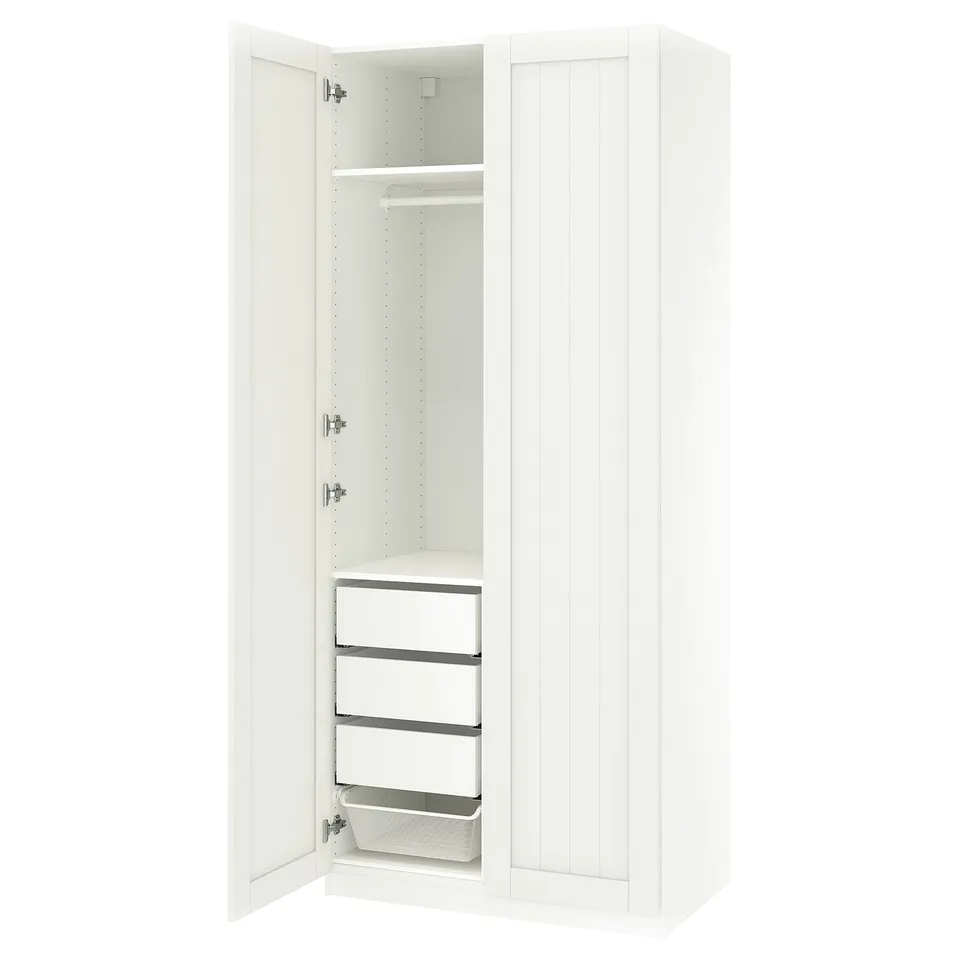 PAX wardrobe in white, slim design. Adjustable shelves, drawers, and hanging space. Modern, clean look, ideal for compact areas.