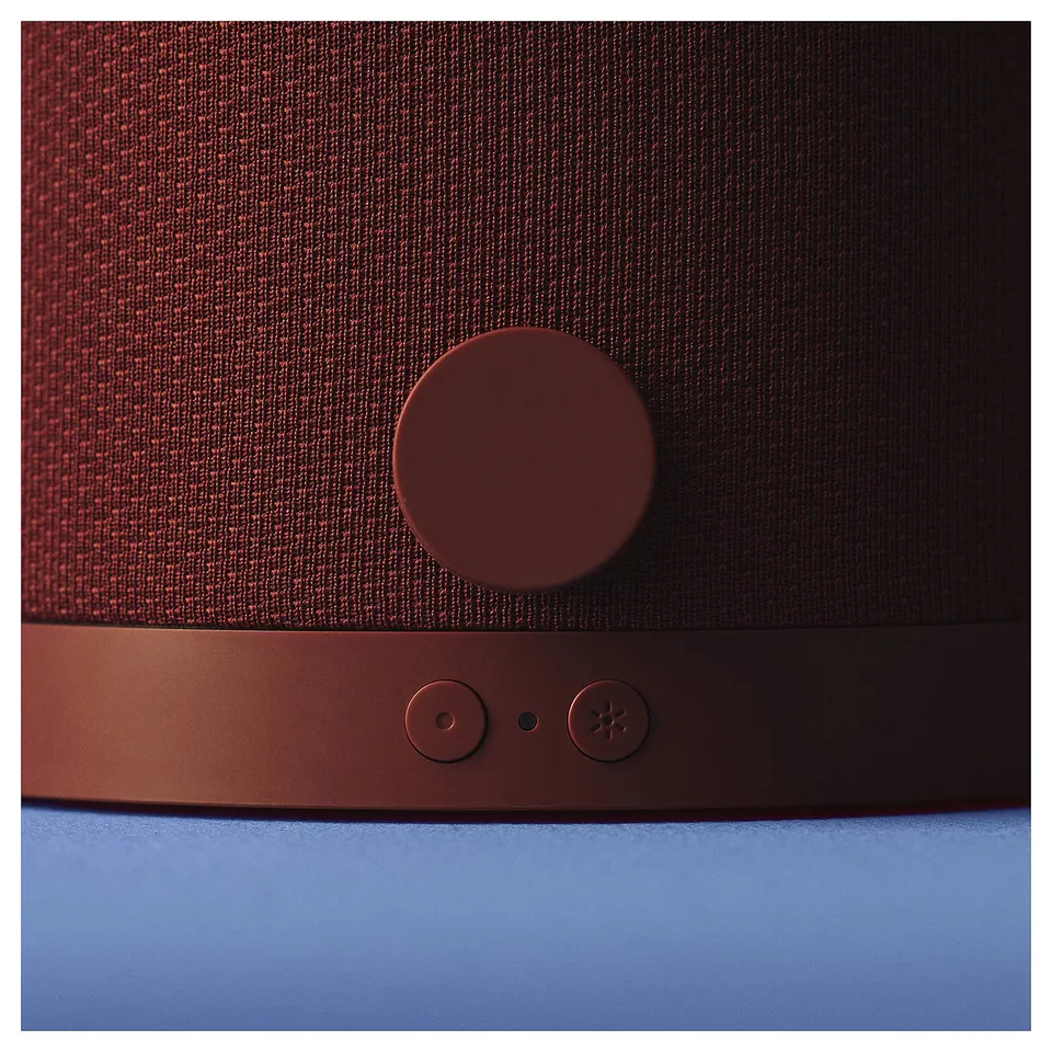 KULGLASS speaker, modern design, brown colour, fabric & plastic. Round button, slim shape.
