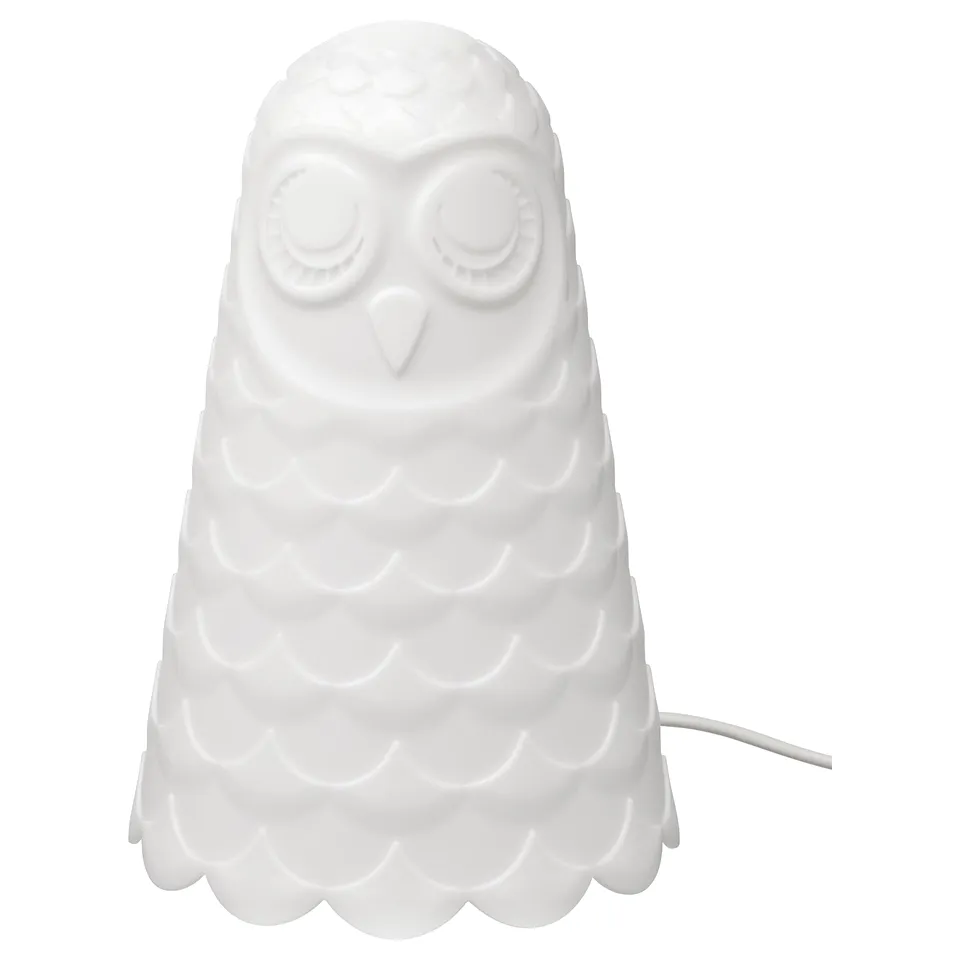 White, owl-shaped SOLBO lamp. Made from polycarbonate and polypropylene plastic. Soft mood light for bedside.