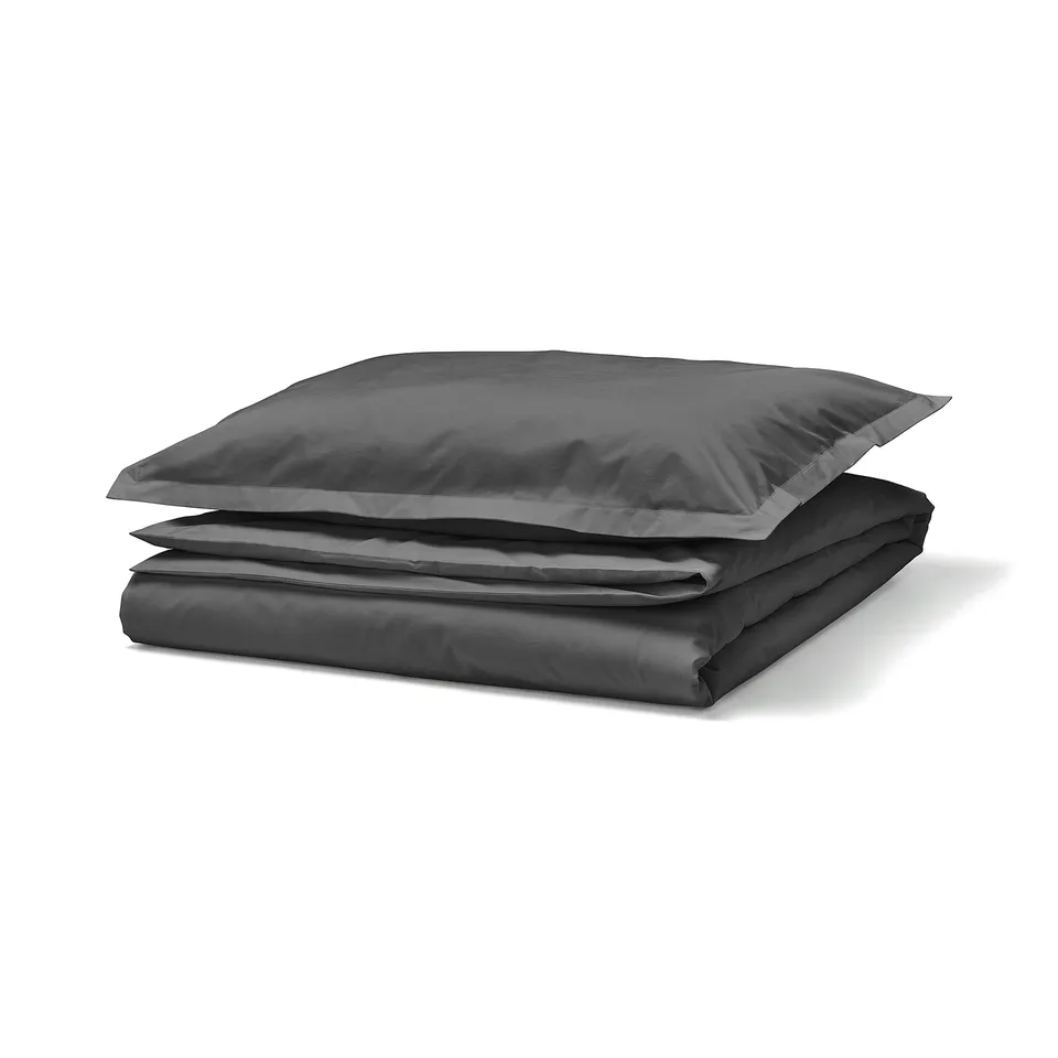 Dark grey HAMPFLOCKEL duvet set, folded in crisp cotton squares.