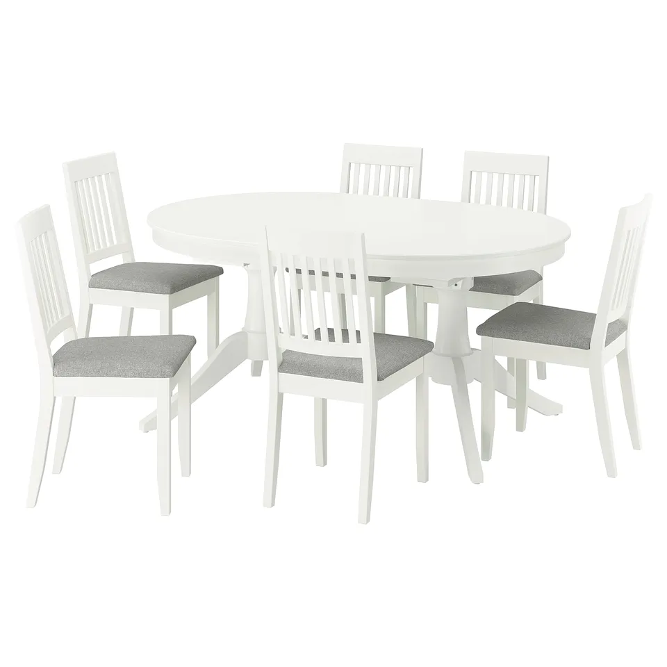 IKEA ROSENTORP: white extendable oval table with 6 matching chairs. Chairs upholstered in grey fabric.