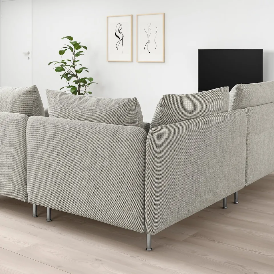 Grey ikea SÖDERHAMN sectional sofa in modern living room with tv & plant.
