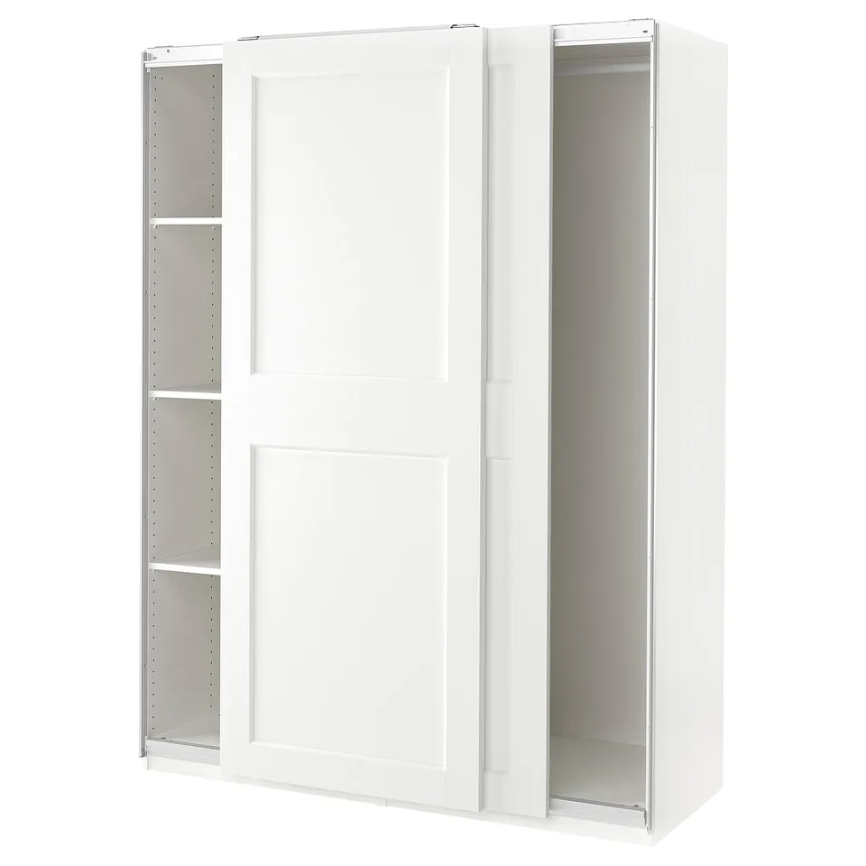 White PAX wardrobe with sliding doors and internal shelves.
