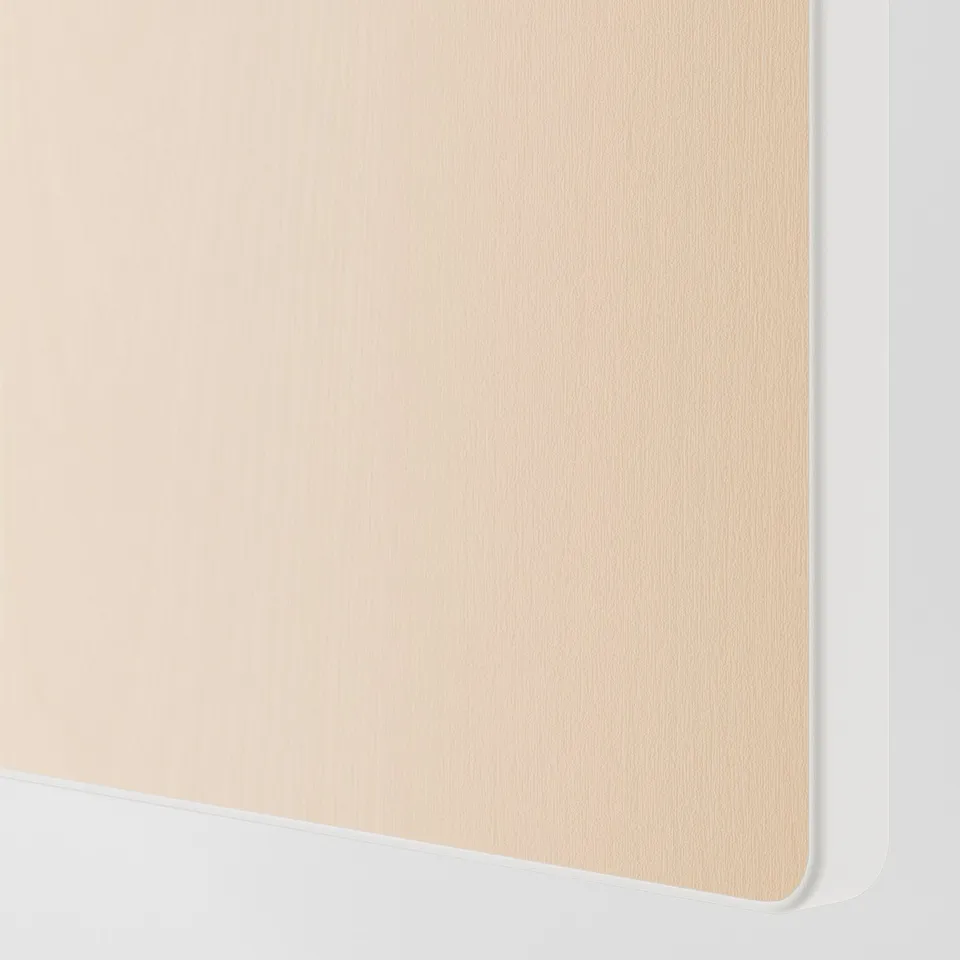 Close-up of a sleek, light-colored wooden drawer with smooth edges, showcasing its quality and finish.