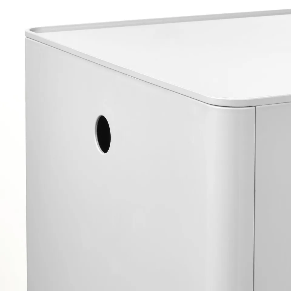 A modern, white, cubic storage box with an oval handle.