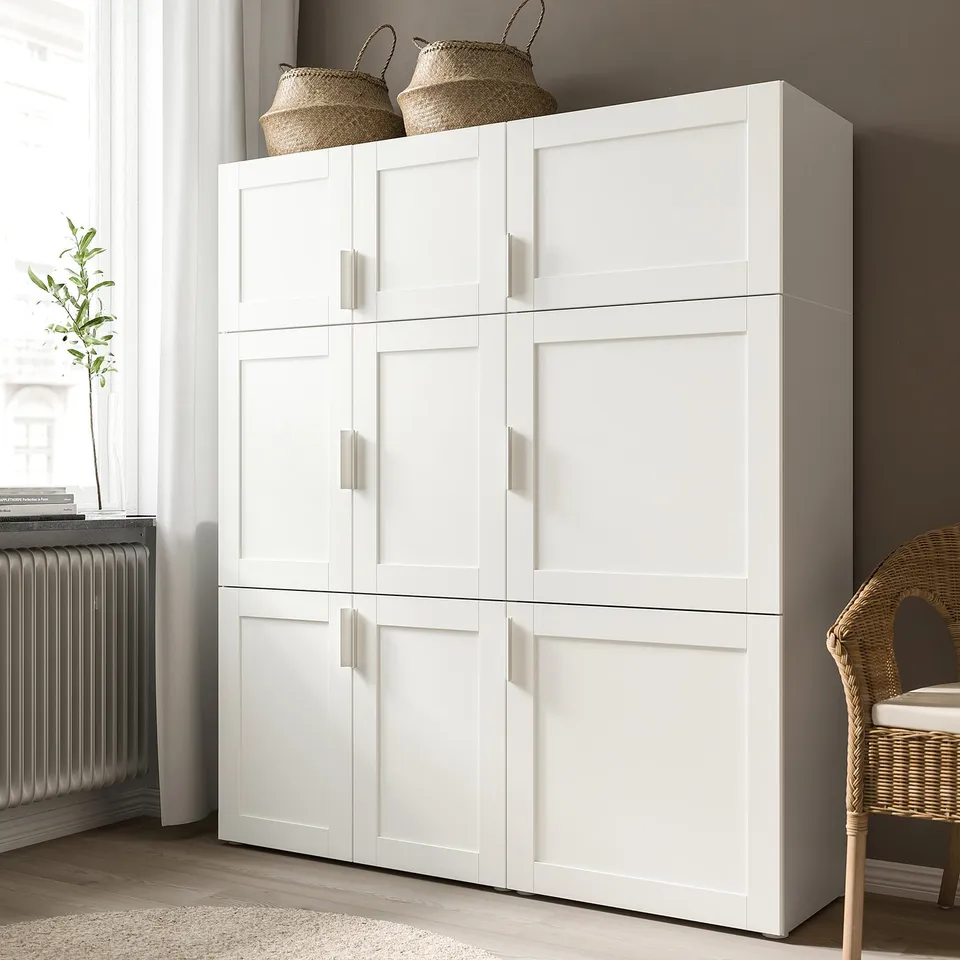 White SANNIDAL cabinet with multiple doors offers storage; fits platsa system.